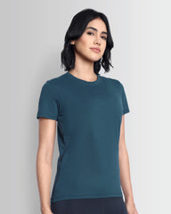Model wearing Dcyphr's Women Essentials Stretch Brand Tee (Legion Blue).