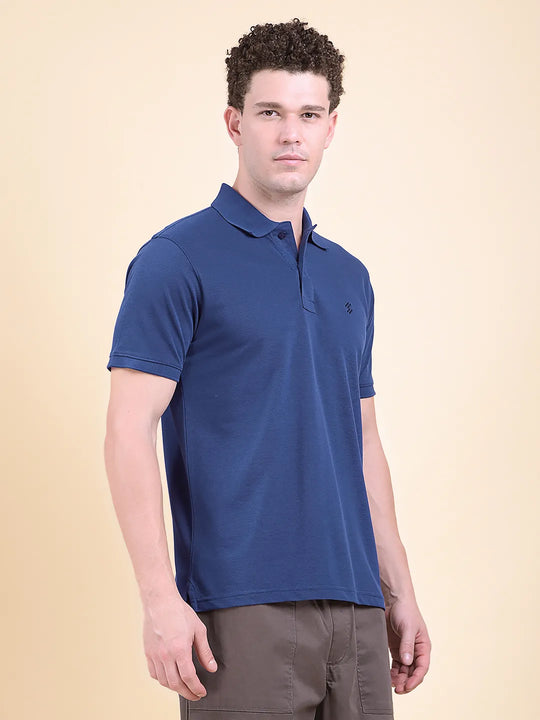 Man wearing a blue polo shirt  (DCYPHR Men&