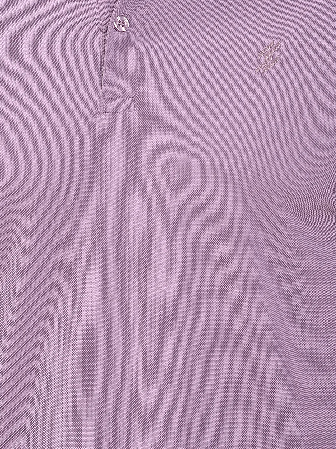 Close-up of a light purple polo t-shirt (DCYPHR Men's Element Polo - Dusk Plum) with a brand logo on the chest.